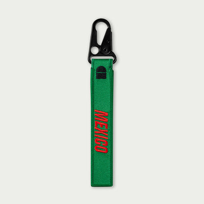 Green keychain with 'MEXICO' embroidery on a white background