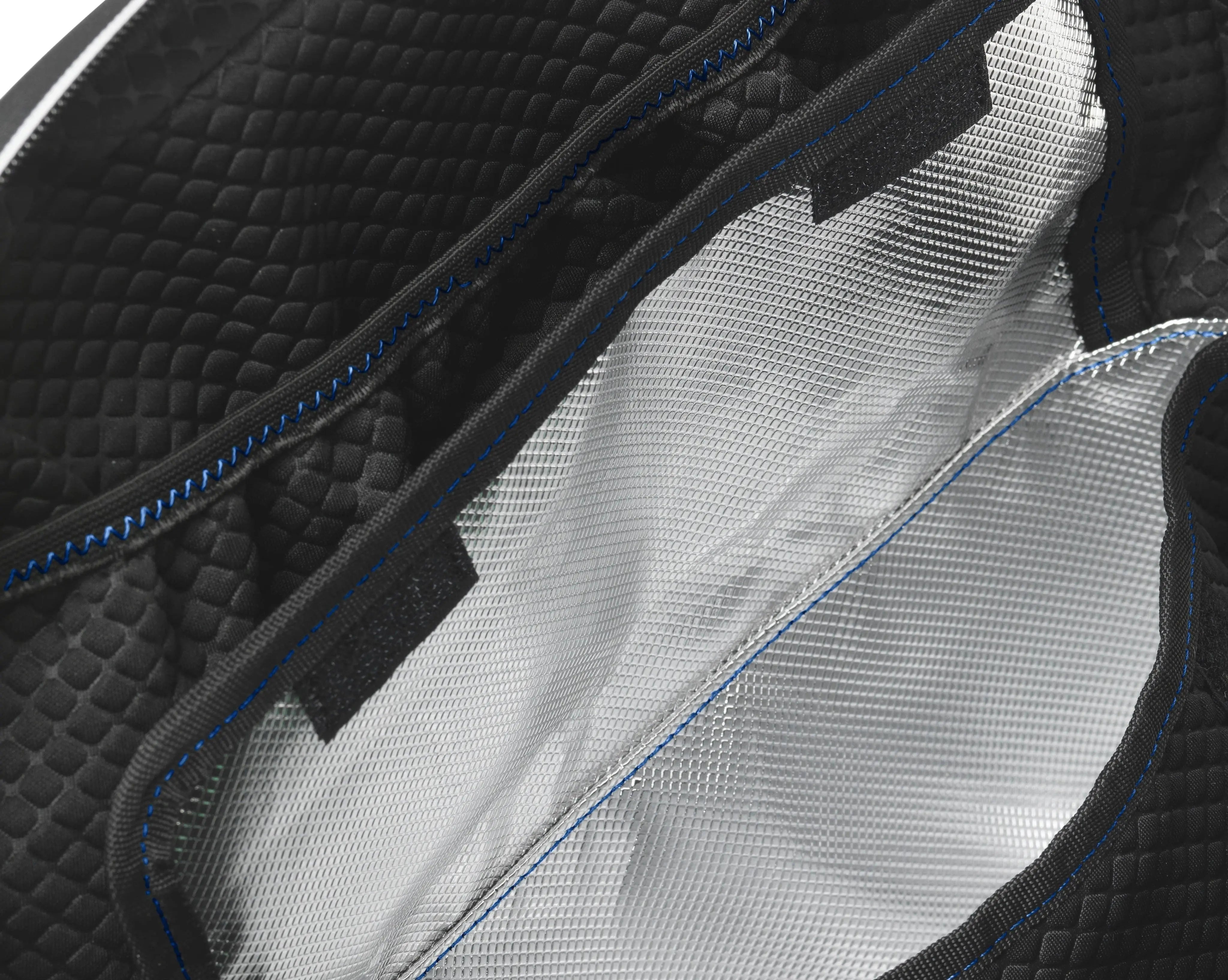 close up of insulated lunch box compartment inside Shirt Shaped backpack by alpha