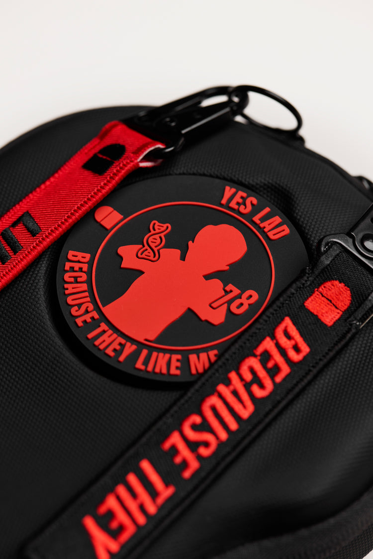 Black bag with red text and graphics on a white background