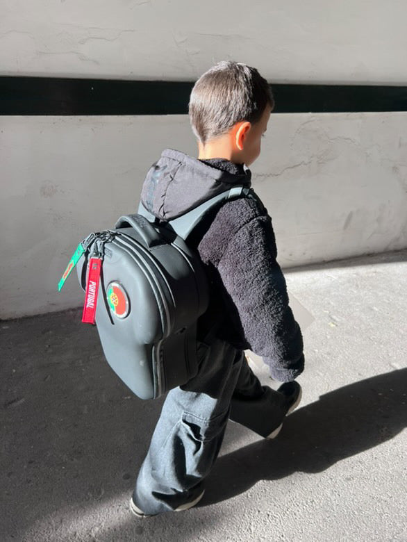 kids walking to school with his shirt-shaped medium black backpack customised by alpha