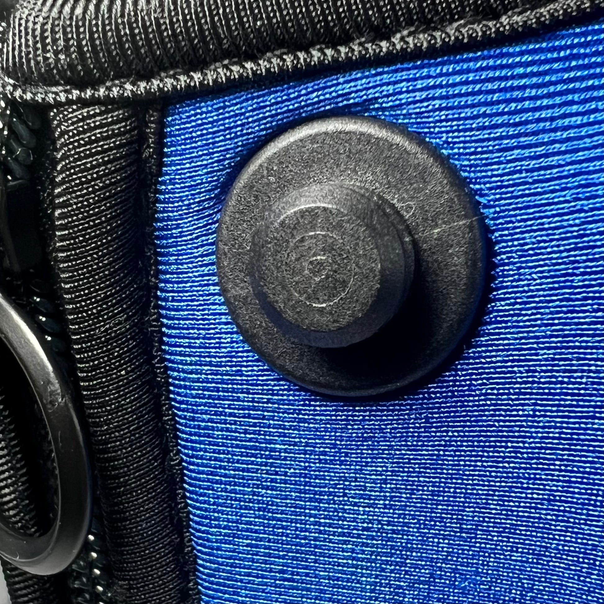 shirt-shaped bottle and sleeve fidlock snap which connects with alpha shirt-shaped backpacks