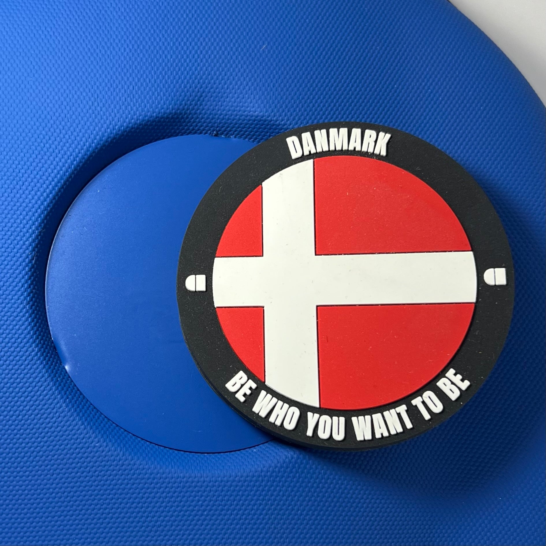 metal plate on shirt-shaped backpack fitting alpha magnetic rubber patch