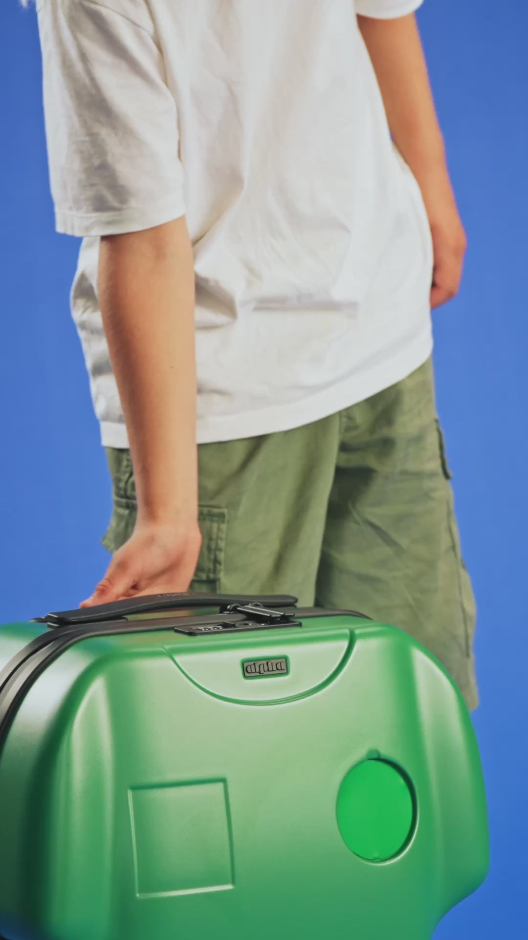 showcasing shirt-shaped cabin luggage in green and showcasing customisation